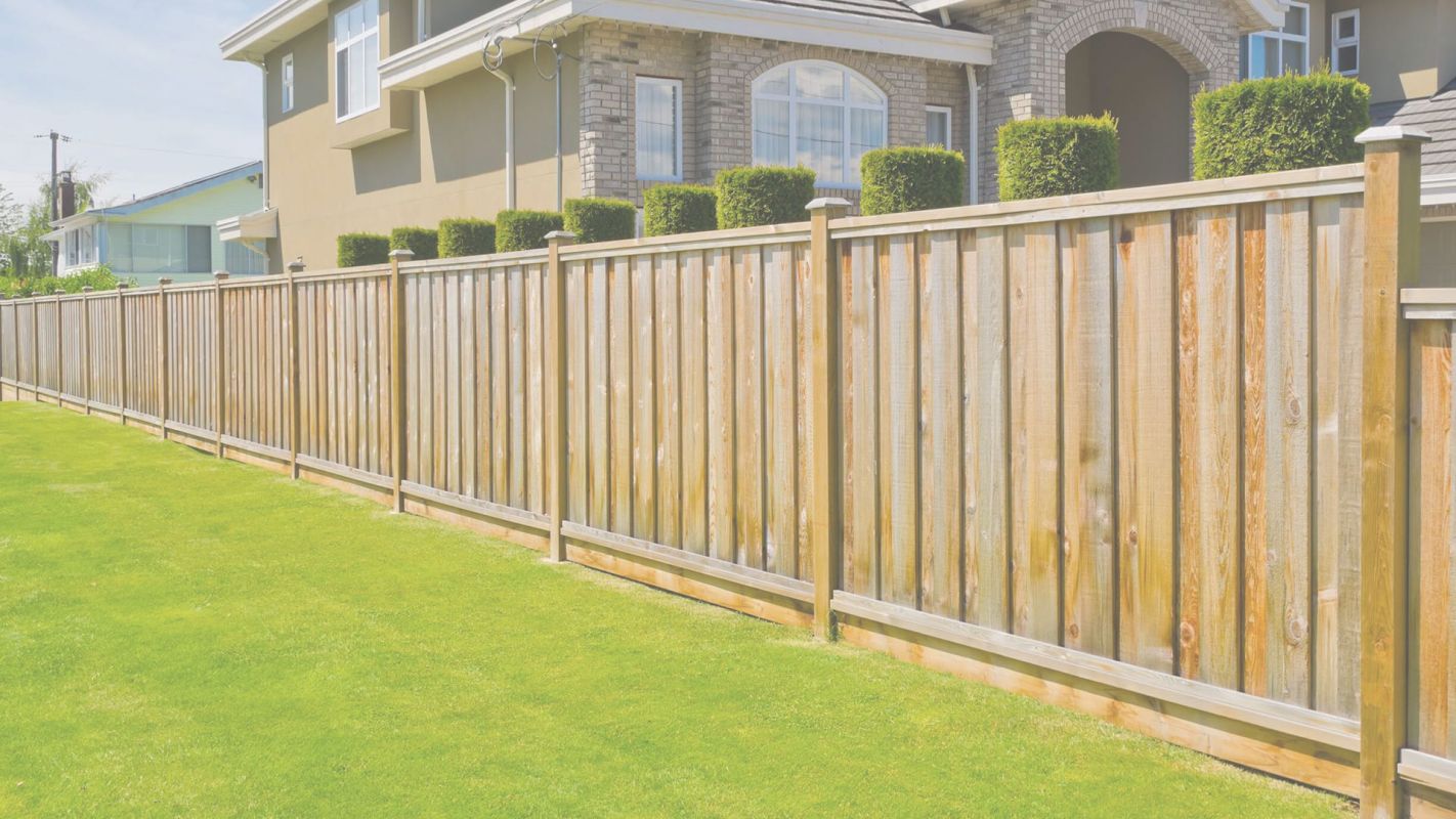 Wood Fence Installation to Guard Home with Style