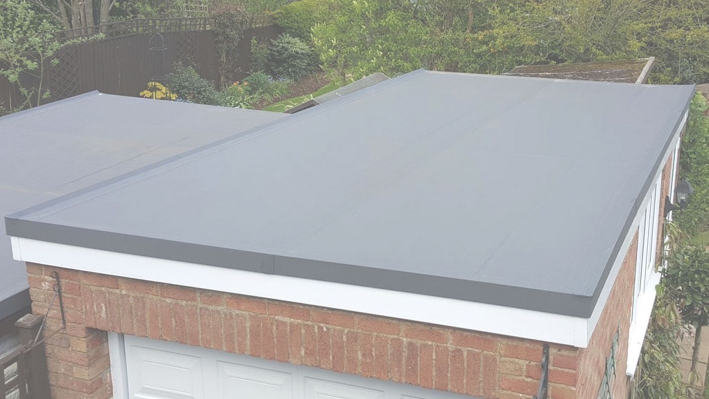 Take Advantage of Our Flat Roof Installation Special Services in Foxborough, MA.