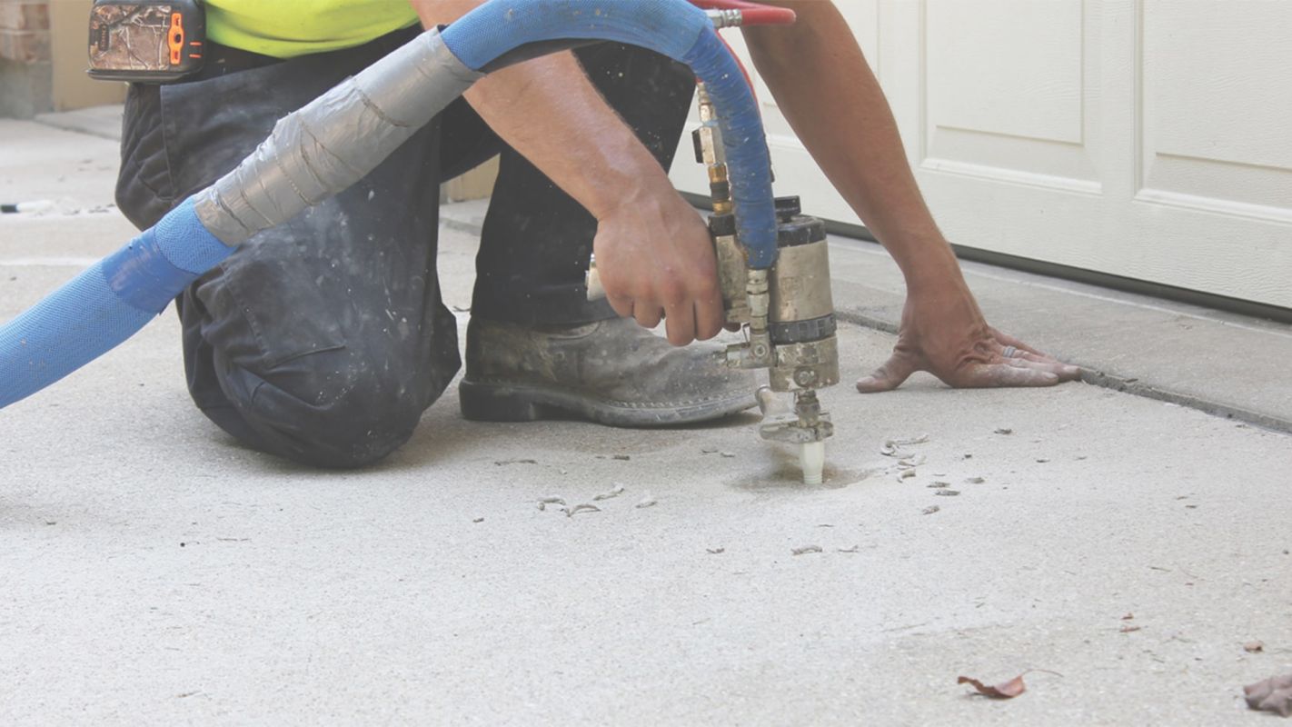 Filling the Voids with Polyurethane Injection Garage Flooring Service Blue Springs, MO