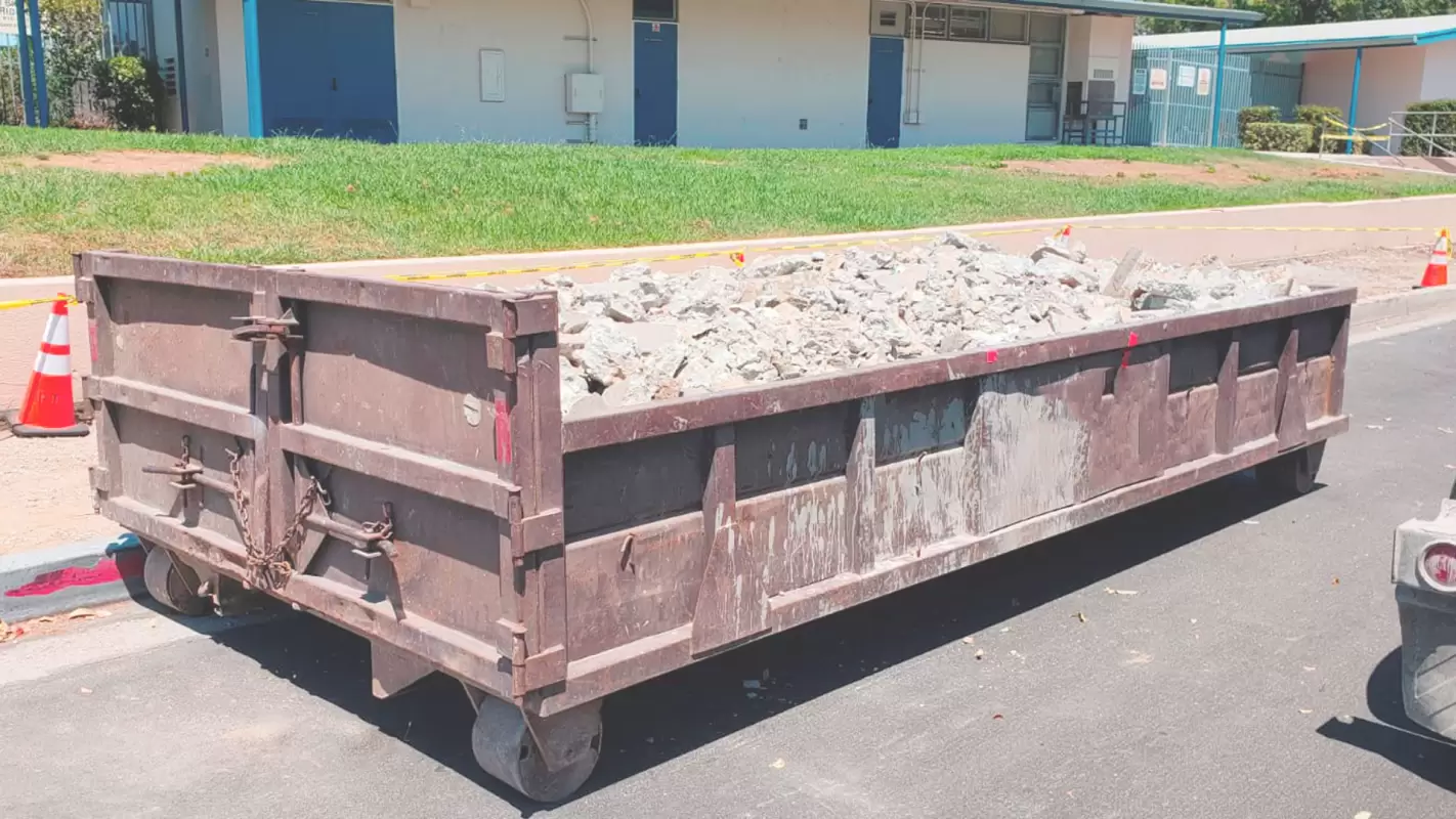 Concrete Dumpsters Take Care of All the Trash on the Construction Site in Upland, CA