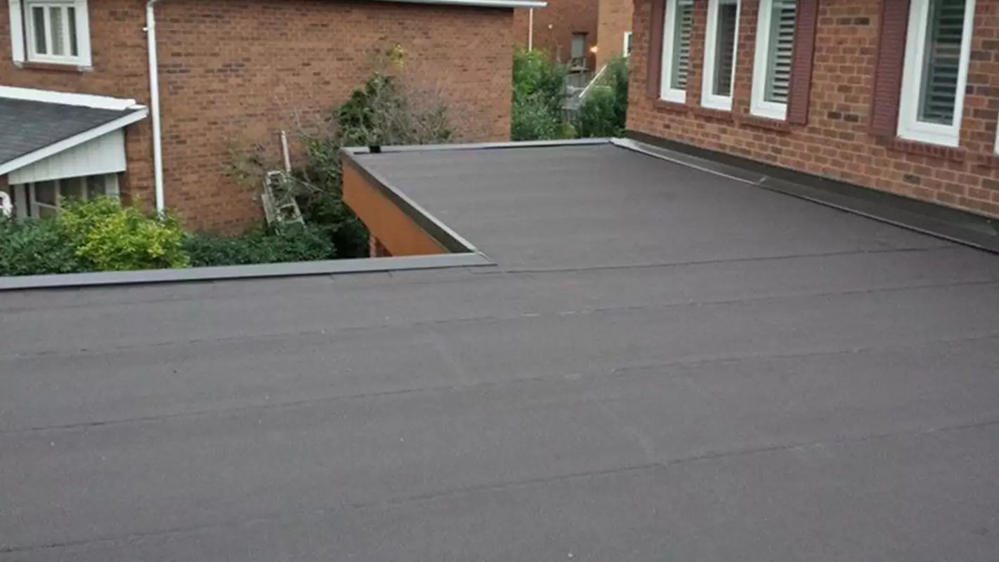 Flat Roof Replacements for Roofs Damaged by Cracks, & Tears
