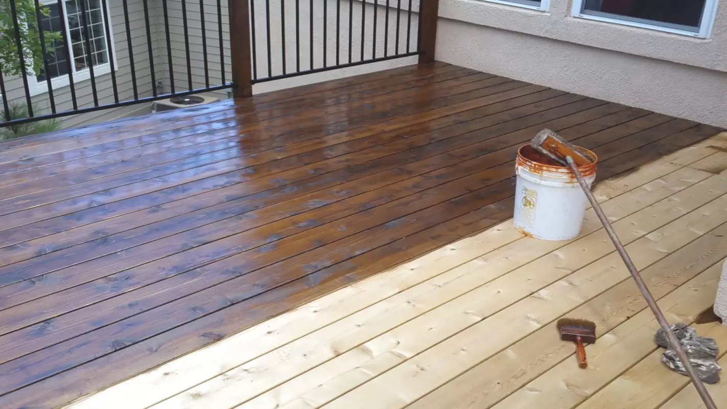 Elevate Spaces with Deck Staining and Painting