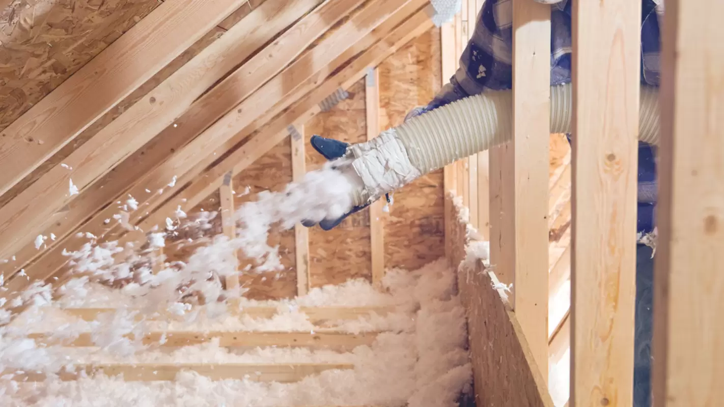 Discover our blown-in attic insulation services with precision!