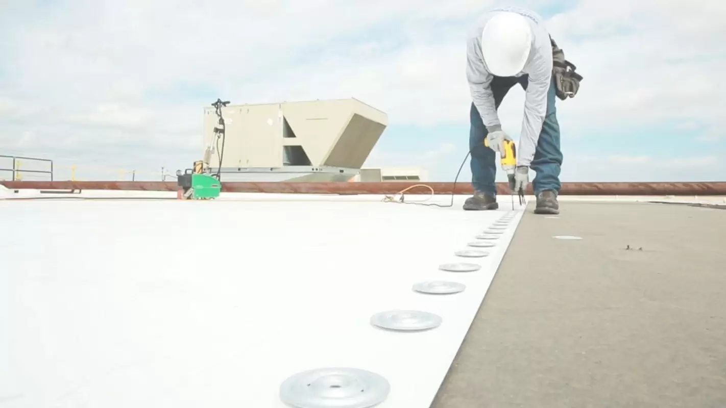 Hire our experts to get stress-free Commercial TPO Roof Coatings