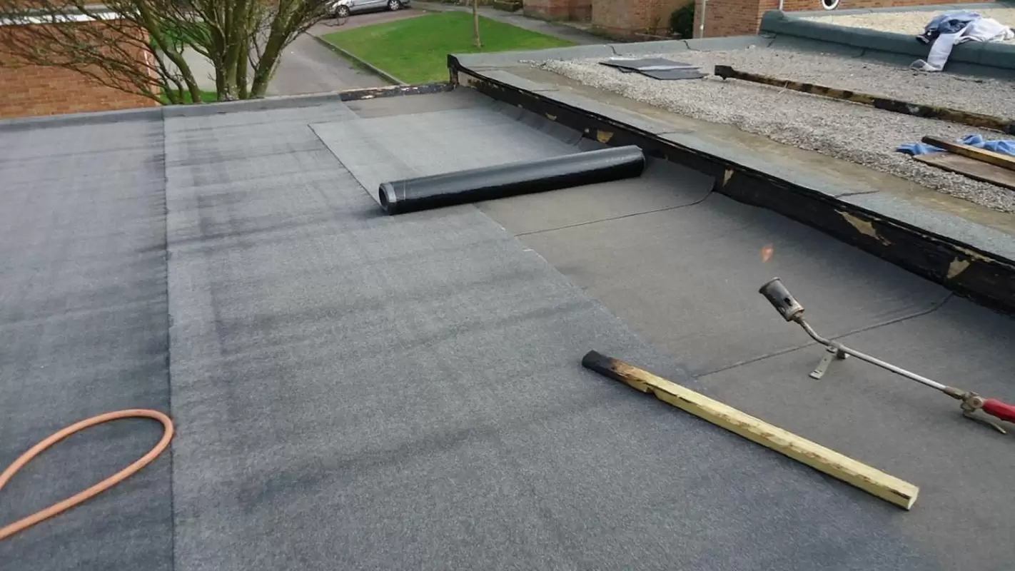 End Your Quest for “Flat Roof Repairs Near Me” by Hiring Us!